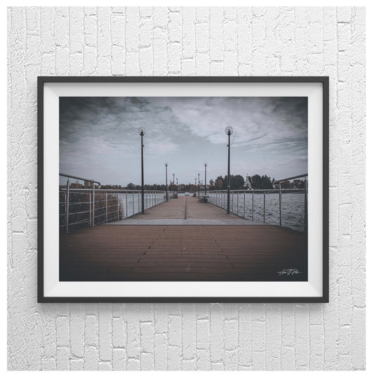 A peaceful walkway over calm waters